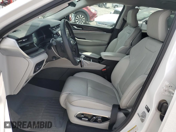 2023 Jeep Grand Cherokee Overland with VIN 1C4RJHDG9PC517056, listed as a Copart auction lot 54929955 with 18,418 mi miles and Salvage title. Bid and sale history available at DreamBid. Image 7.