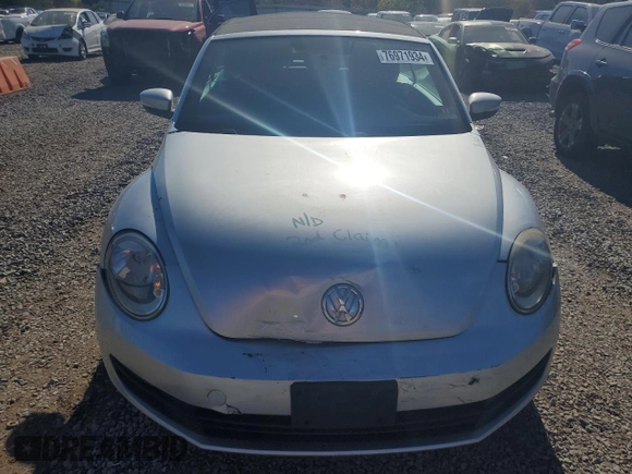 2013 Volkswagen Beetle 2.5L with VIN 3VW5P7ATXDM803952, listed as a Copart auction lot 76971934 with 211,449 mi miles and Salvage Title. Bid and sale history available at DreamBid. Image 5.