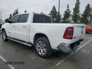 2020 Ram 1500 with VIN 1C6RREKG4LN401571, listed as a Copart auction lot 43620245 with 99,979 mi miles and Salvage title. Bid and sale history available at DreamBid. Image 2.