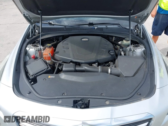 2016 Cadillac CTS with VIN 1G6AR5SS9G0194126, listed as a IAAI auction lot 41972437 with 129,742 mi miles and . Bid and sale history available at DreamBid. Image 10.