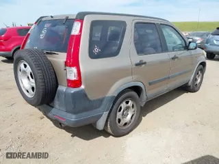 2006 Honda CR-V LX with VIN JHLRD68536C029291, listed as a IAAI auction lot 42031959 with 195,392 mi miles. Bid and sale history available at carsss.com. Image 4.