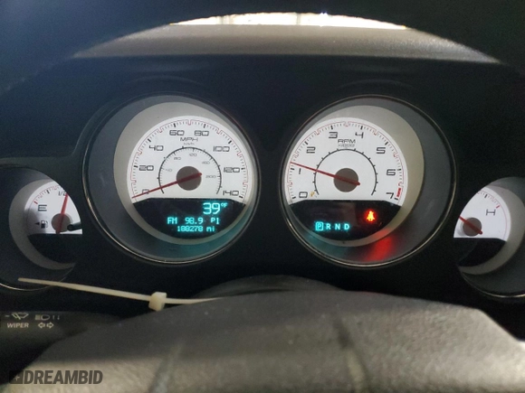 2013 Dodge Challenger SXT with VIN 2C3CDYAG5DH725000, listed as a Copart auction lot 82157004 with 188,278 mi miles and Salvage Title. Bid and sale history available at carsss.com. Image 9.