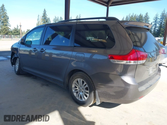 2011 Toyota Sienna XLE AAS with VIN 5TDYK3DC7BS047822, listed as a IAAI auction lot 42073635 with 150,424 mi miles. Bid and sale history available at carsss.com. Image 3.