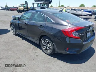 2017 Honda Civic EX-L с VIN 2HGFC1F78HH636069, выставлен на аукционе IAAI как лот 42489304 с пробегом 97 876 миль миль и . История ставок и продаж доступна на DreamBid. Изображение 3.