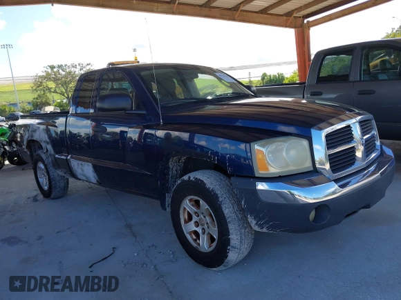 2005 Dodge Dakota SLT with VIN 1D7HW42N05S365877, listed as a IAAI auction lot 40418188 with 280,423 mi miles and . Bid and sale history available at DreamBid. Image 1.