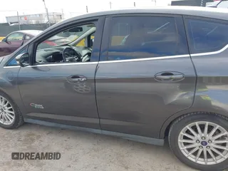 2016 Ford C-Max SEL z VIN 1FADP5CU4GL101968, wystawiony jako IAAI lot #42255922 z przebiegiem 165 358 mil mil oraz . Historia ofert i sprzedaży dostępna na DreamBid. Obrazek 15.