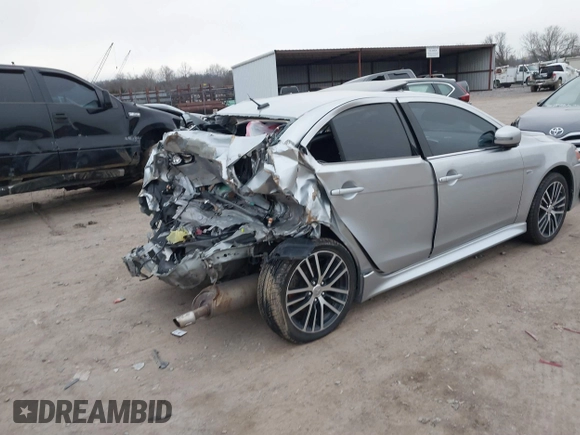 2016 Mitsubishi Lancer GT with VIN JA32U8FW1GU008973, listed as a IAAI auction lot 41293100 with 84,075 mi miles. Bid and sale history available at carsss.com. Image 4.