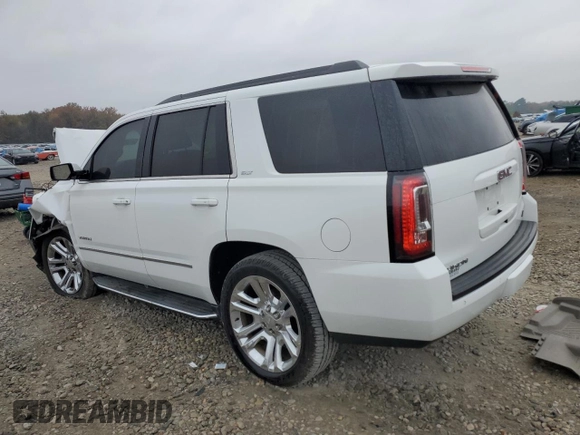 2019 GMC Yukon SLT with VIN 1GKS2BKC2KR338007, listed as a Copart auction lot 82336394 with 105,087 mi miles and Salvage Title. Bid and sale history available at carsss.com. Image 2.