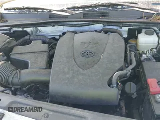 2016 Toyota Tacoma SR with VIN 3TMCZ5AN0GM003224, listed as a IAAI auction lot 42289910 with 140,899 mi miles and . Bid and sale history available at DreamBid. Image 19.