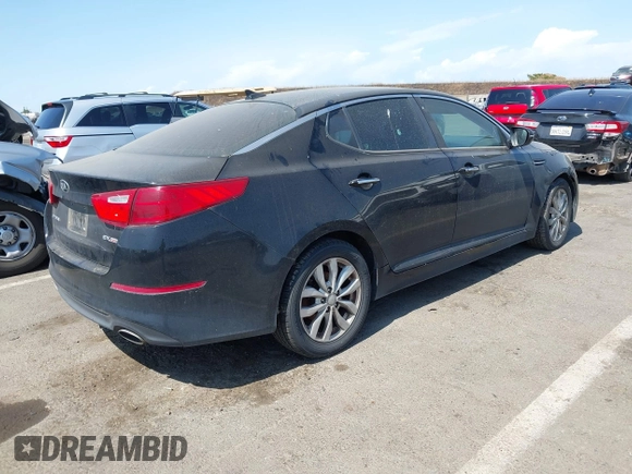 2015 Kia Optima EX z VIN 5XXGN4A75FG420329, wystawiony jako IAAI lot #42574401 z przebiegiem 223 816 mil mil oraz . Historia ofert i sprzedaży dostępna na DreamBid. Obrazek 4.