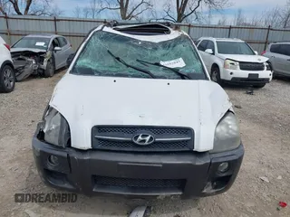 2006 Hyundai Tucson GLS with VIN KM8JN72D26U322893, listed as a IAAI auction lot 41882842 with 116,972 mi miles. Bid and sale history available at carsss.com. Image 12.