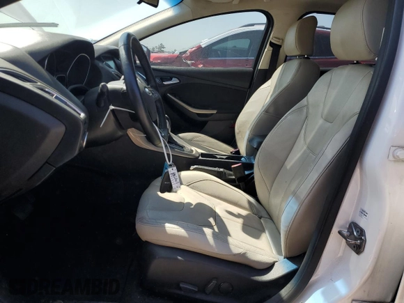 2015 Ford Focus Titanium with VIN 1FADP3J23FL248349, listed as a Copart auction lot 52599275 with 124,450 mi miles and Clean Title. Bid and sale history available at carsss.com. Image 7.
