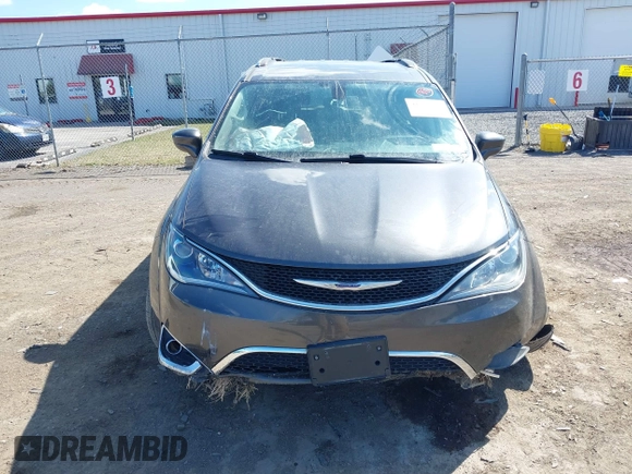 2018 Chrysler Pacifica Touring L with VIN 2C4RC1BGXJR356199, listed as a IAAI auction lot 41886721 with 111,514 mi miles and . Bid and sale history available at DreamBid. Image 12.