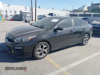2019 Kia Forte LXS with VIN 3KPF24ADXKE137521, listed as a IAAI auction lot 41820693 with 54,987 mi miles and . Bid and sale history available at carsss.com. Image 2.