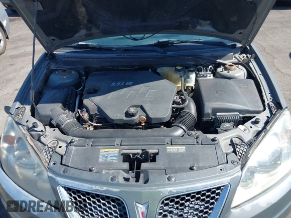 2009 Pontiac G6 GT 1SB z VIN 1G2ZK57K594234408, wystawiony jako IAAI lot #42547870 z przebiegiem 206 547 mil mil oraz . Historia ofert i sprzedaży dostępna na DreamBid. Obrazek 10.