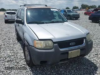 2003 Ford Escape XLT Popular with VIN 1FMYU03103KA06199, listed as a Copart auction lot 58731515 with 181,429 mi miles and Salvage title. Bid and sale history available at DreamBid. Image 14.