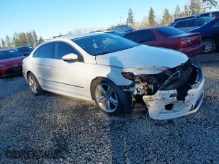 2014 Volkswagen CC Sport with VIN WVWAP7AN1EE540051, listed as a IAAI auction lot 41381933 with 54,896 mi miles. Bid and sale history available at carsss.com. Image 1.