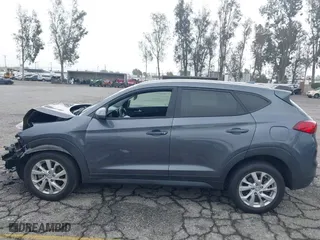 2019 Hyundai Tucson Value with VIN KM8J33A49KU071977, listed as a IAAI auction lot 41515460 with 24,701 mi miles. Bid and sale history available at carsss.com. Image 13.