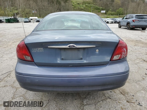 2000 Ford Taurus SE z VIN 1FAFP53U5YA259273, wystawiony jako Copart lot #52787305 z przebiegiem 234 848 mil mil oraz Szkoda całkowita • Salvage title. Historia ofert i sprzedaży dostępna na DreamBid. Obrazek 6.