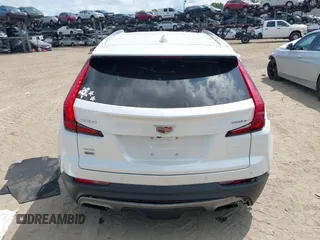 2019 Cadillac XT4 AWD Premium Luxury z VIN 1GYFZDR48KF131619, wystawiony jako IAAI lot #42202281 z przebiegiem 67 048 mil mil oraz . Historia ofert i sprzedaży dostępna na DreamBid. Obrazek 16.