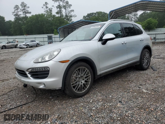 2014 Porsche Cayenne S with VIN WP1AB2A25ELA57213, listed as a Copart auction lot 57843255 with 165,501 mi miles and Salvage title. Bid and sale history available at DreamBid. Image 1.