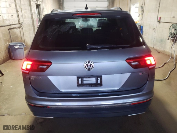2020 Volkswagen Tiguan SE with VIN 3VV2B7AX6LM002197, listed as a Copart auction lot 48994675 with 25,700 mi miles and Salvage Title. Bid and sale history available at carsss.com. Image 6.