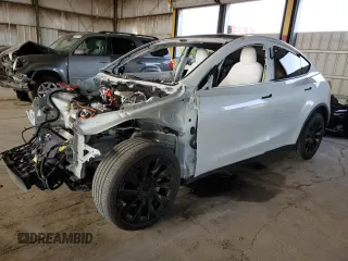 2024 Tesla Model Y Long Range с VIN 7SAYGDEE7RA217991, выставлен на аукционе Copart как лот 50885695 с пробегом Не указан миль и Списание • Salvage title. История ставок и продаж доступна на DreamBid. Изображение 1.