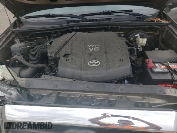2013 Toyota Tacoma z VIN 3TMLU4EN4DM124465, wystawiony jako Copart lot #58167135 z przebiegiem 116 098 mil mil oraz Szkoda całkowita • Salvage title. Historia ofert i sprzedaży dostępna na DreamBid. Obrazek 11.