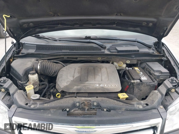 2012 Chrysler Town & Country Touring L with VIN 2C4RC1CG1CR163442, listed as a IAAI auction lot 42207924 with 197,111 mi miles and . Bid and sale history available at DreamBid. Image 10.