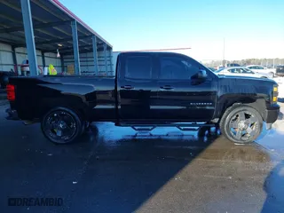 2014 Chevrolet Silverado 1500 LT with VIN 1GCRCREC5EZ400824, listed as a IAAI auction lot 41658622 with 107,105 mi miles. Bid and sale history available at carsss.com. Image 13.