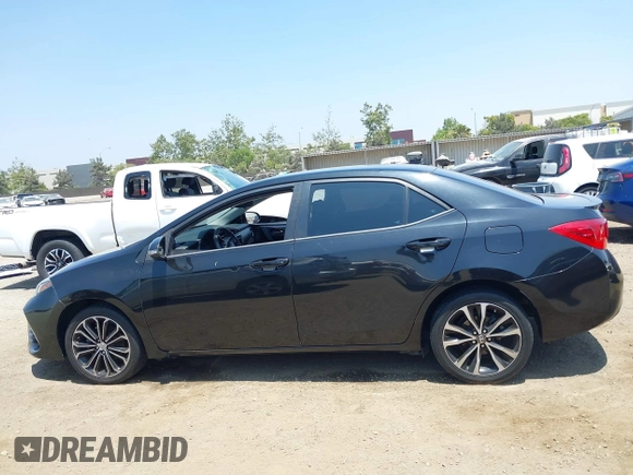 2017 Toyota Corolla L with VIN 5YFBURHE1HP712536, listed as a IAAI auction lot 42592613 with 76,672 mi miles and . Bid and sale history available at DreamBid. Image 14.