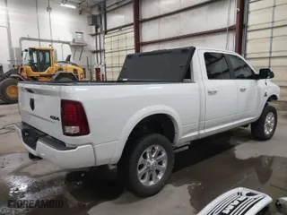 2018 Ram 2500 Laramie with VIN 3C6UR5FL1JG213467, listed as a IAAI auction lot 41513596 with 100,855 mi miles. Bid and sale history available at carsss.com. Image 4.