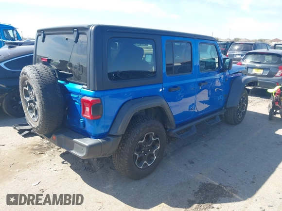 2021 Jeep Wrangler Unlimited Willys with VIN 1C4HJXDN0MW737796, listed as a IAAI auction lot 41733946 with 44,281 mi miles and . Bid and sale history available at DreamBid. Image 4.