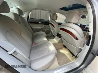 2011 Audi A8 with VIN WAURVAFD7BN018734, listed as a Copart auction lot 63735055 with 79,694 mi miles and Clean title. Bid and sale history available at DreamBid. Image 6.