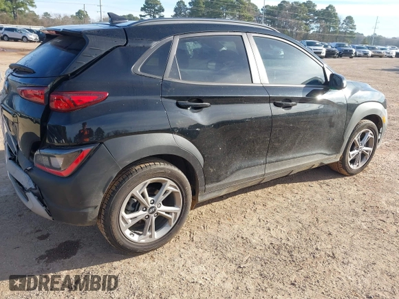 2023 Hyundai Kona SEL with VIN KM8K62AB0PU938484, listed as a IAAI auction lot 41722445 with 52,058 mi miles and . Bid and sale history available at DreamBid. Image 4.