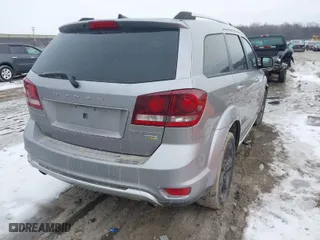 2019 Dodge Journey Crossroad with VIN 3C4PDCGG5KT700741, listed as a IAAI auction lot 41511060 with 101,273 mi miles. Bid and sale history available at carsss.com. Image 4.