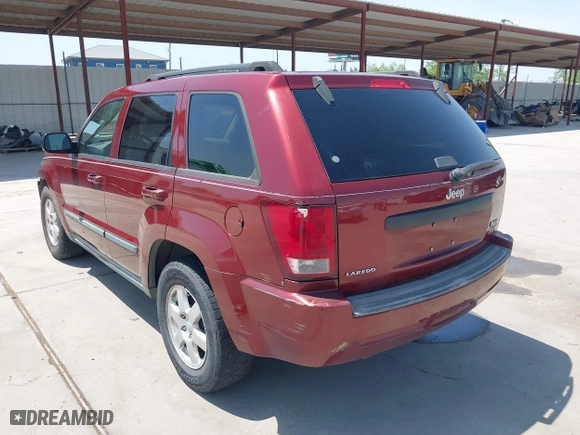 2009 Jeep Grand Cherokee Laredo with VIN 1J8GS48K39C521160, listed as a IAAI auction lot 42039577 with 262,829 mi miles. Bid and sale history available at carsss.com. Image 3.