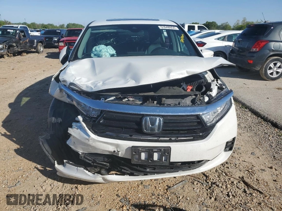 2021 Honda Odyssey Touring with VIN 5FNRL6H86MB003309, listed as a Copart auction lot 51648654 with 132,393 mi miles and Salvage Title. Bid and sale history available at carsss.com. Image 5.
