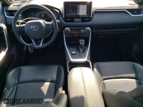 2021 Toyota RAV4 Hybrid XSE with VIN 2T3E6RFV9MW013200, listed as a Copart auction lot 52163255 with 58,336 mi miles and Salvage title. Bid and sale history available at DreamBid. Image 8.
