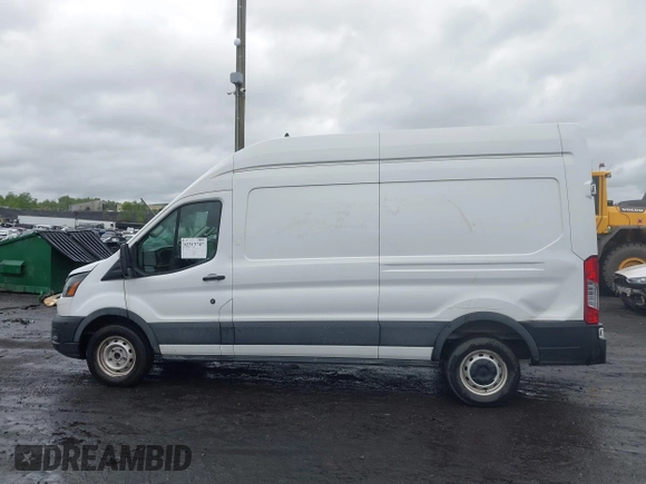 2021 Ford Transit Cargo with VIN 1FTBW1X84MKA98047, listed as a IAAI auction lot 42313747 with 65,600 mi miles and . Bid and sale history available at DreamBid. Image 14.