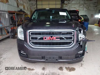 2015 GMC Yukon XL SLT with VIN 1GKS2HKC6FR667110, listed as a IAAI auction lot 41472250 with 141,383 mi miles. Bid and sale history available at carsss.com. Image 12.