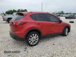 2014 Mazda CX-5 Grand Touring with VIN JM3KE2DY1E0332971, listed as a Copart auction lot 51235415 with 105,338 mi miles and Salvage Title. Bid and sale history available at carsss.com. Image 3.