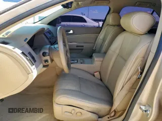 2005 Cadillac STS z VIN 1G6DC67A350148213, wystawiony jako Copart lot #59777405 z przebiegiem 118 027 mil mil oraz Czysty tytuł • Clean title. Historia ofert i sprzedaży dostępna na DreamBid. Obrazek 7.