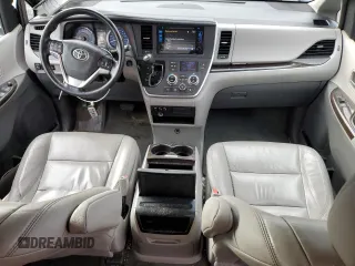 2015 Toyota Sienna XLE with VIN 5TDYK3DC4FS643475, listed as a Copart auction lot 52697405 with 153,808 mi miles and Salvage Title. Bid and sale history available at DreamBid. Image 8.