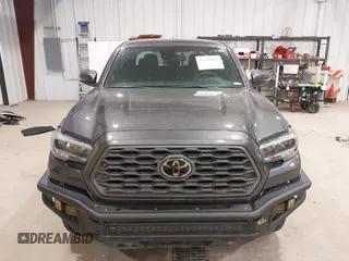 2023 Toyota Tacoma SR с VIN 3TYCZ5AN0PT178013, выставлен на аукционе IAAI как лот 42180865 с пробегом 19 355 миль миль и . История ставок и продаж доступна на DreamBid. Изображение 13.