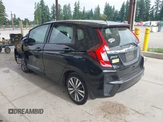 2015 Honda Fit EX-L z VIN 3HGGK5H81FM701122, wystawiony jako IAAI lot #42610165 z przebiegiem 74 969 mil mil oraz . Historia ofert i sprzedaży dostępna na DreamBid. Obrazek 3.