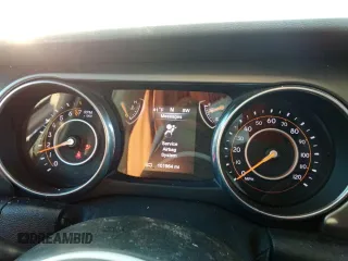 2018 Jeep Wrangler Sport with VIN 1C4GJXAG7JW188322, listed as a Copart auction lot 87352914 with 101,964 mi miles and Salvage Title. Bid and sale history available at carsss.com. Image 9.