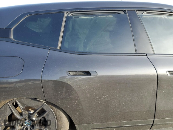 2024 BMW iX xDrive50 z VIN WB523CF02RCP06595, wystawiony jako Copart lot #44179575 z przebiegiem Nie podano mil oraz Szkoda całkowita • Salvage title. Historia ofert i sprzedaży dostępna na DreamBid. Obrazek 10.