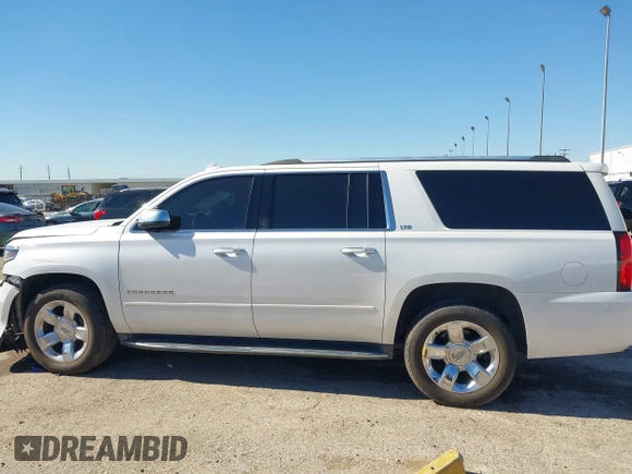 2016 Chevrolet Suburban LTZ with VIN 1GNSCJKC0GR135103, listed as a IAAI auction lot 41372158 with 167,540 mi miles and . Bid and sale history available at DreamBid. Image 14.