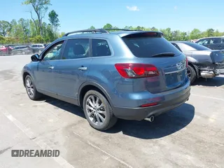 2015 Mazda CX-9 Grand Touring with VIN JM3TB3DV4F0448210, listed as a IAAI auction lot 42061711 with 149,289 mi miles. Bid and sale history available at carsss.com. Image 3.